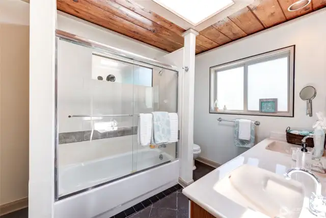 Main floor primary bedroom bath with tub!