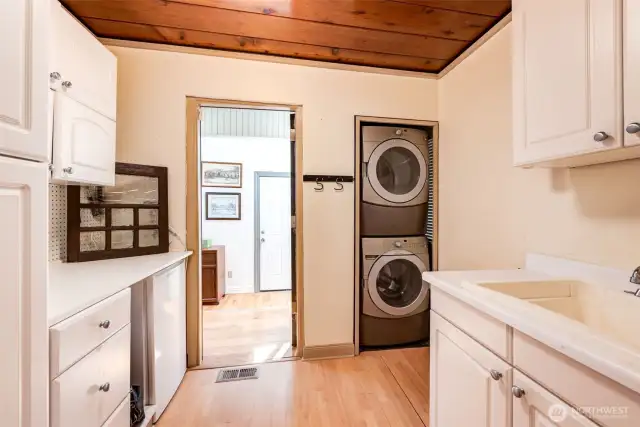 Mud room with plenty of cabinets & sink!
