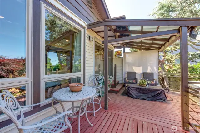 Enjoy the views from this covered seating area on deck for outside living every day!
