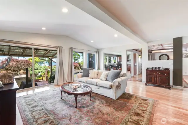 Spacious living room with lots of windows & slider doors to enjoy the gorgeous views!