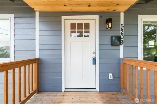 Covered entry porch the occasional rainy day for your convenience.