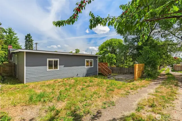 Looking at the rear yard from the south alley.