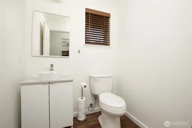 Main level half bathroom.