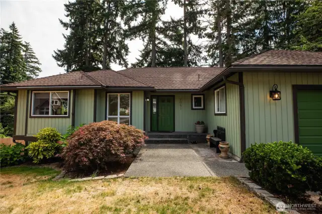 Paint Information: Body - Clary Sage SW6178 by Sherwin Williams. Front Door and Garage - Green Field by Sherwin Williams. Trim - Black Fox by Sherwin Williams.  Home Painted in October 2023.