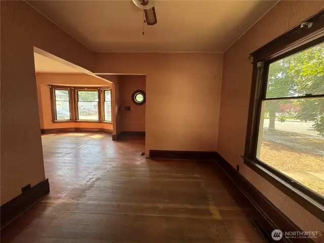 Living room looking towards front entry and dining room