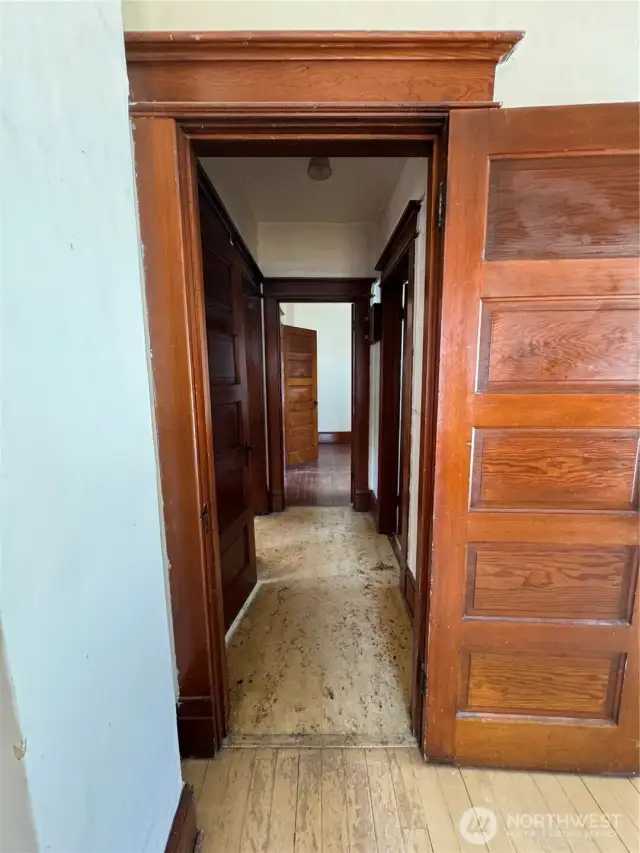 Hallway between bedrooms and bathroom