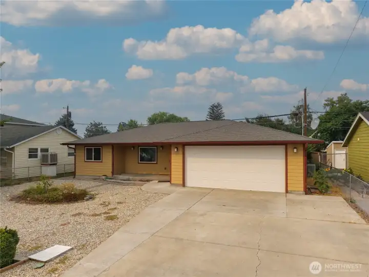 Front of home with low maintenance yard