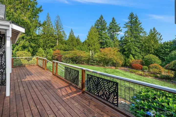 Wrap around deck to enjoy throughout the seasons.