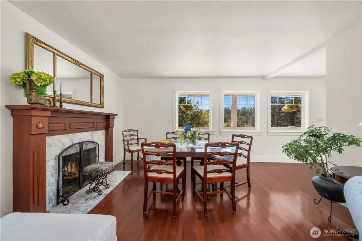 The dining area is romantic with the custom wood burning fireplace that was designed by the owners to replicate what would be found in a Nantucket east coastal home.