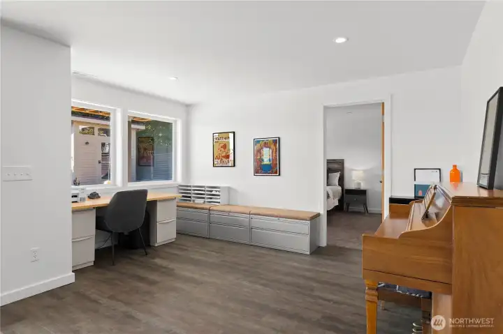 The lower level office/den offers a 2nd work from home space in addition to the 5 bedrooms