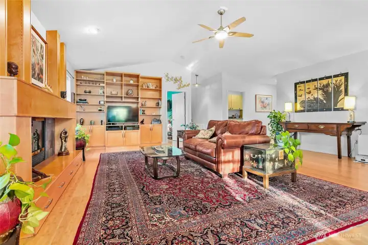 Looking towards the primary suite and stairs to bonus room. Laundry room on the right.
