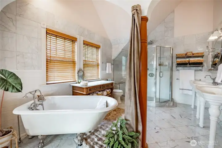 Primary bathroom with double vanities, shower