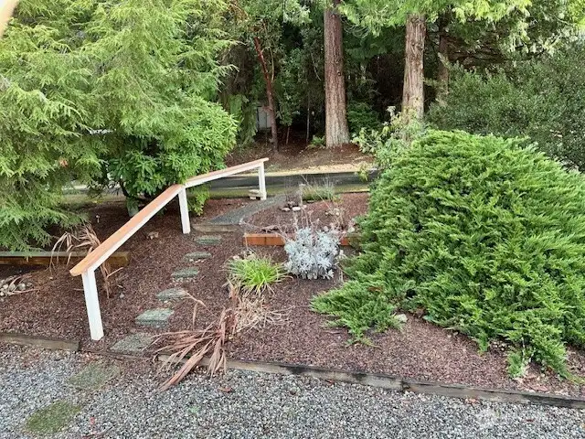 stairs to mail boxes and dumpster