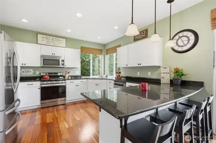 So much cabinet and counter space with large eating bar.