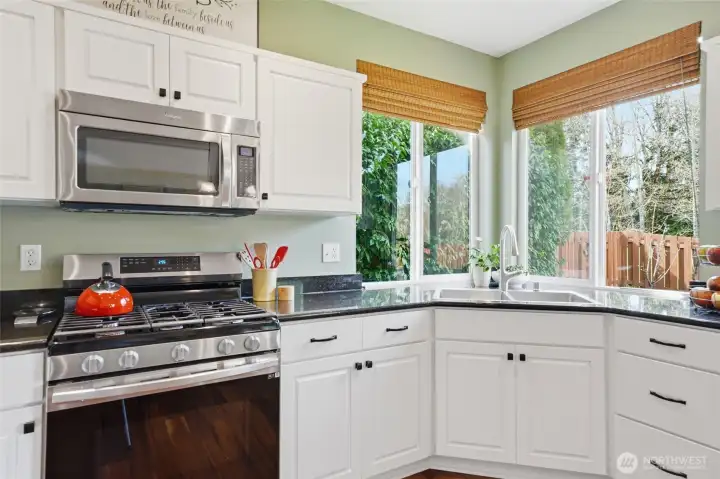 Lots of light and windows to the serene backyard.