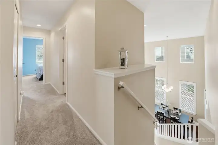 Grand staircase leading to 4 bedrooms and 2 full baths