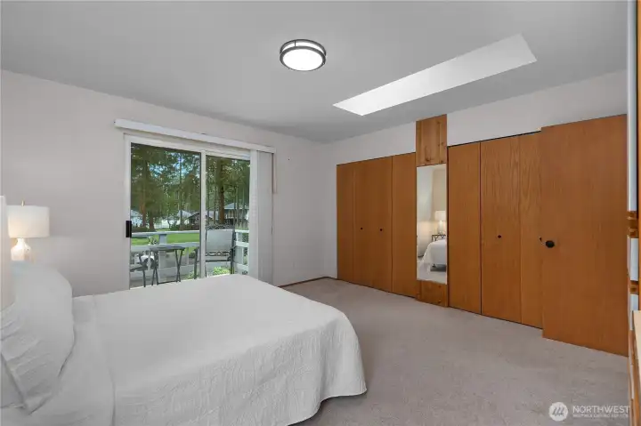 Primary bedroom with wall closets Primary bedroom with wall closets