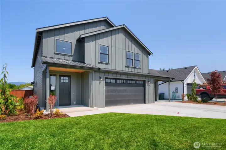 2601 Hattie plan featuring 3-car garage -  Pics are of a different 2601 Hattie plan home. Features and colors may differ.