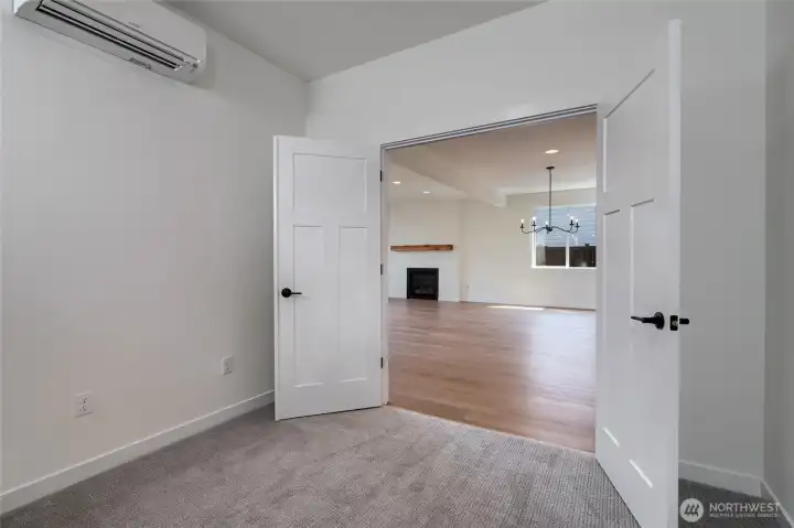 Main level office/flex space with double doors.  Pics are of a different 2601 Hattie plan home. Features and colors may differ.