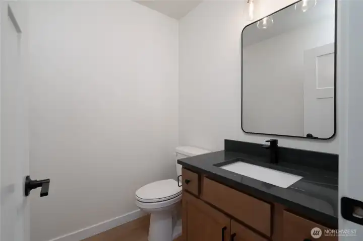 Main level office/flex space with double doors. Pics are of a different2601 Hattie plan home. Features and colors may differ.