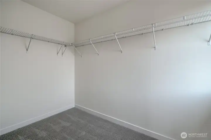 Primary bedroom features 2 large walk-in closets -  Pics are of a different 2601 Hattie plan home. Features and colors may differ.