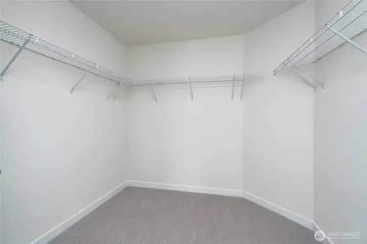 Primary bedroom features 2 large walk-in closets -  Pics are of a different 2601 Hattie plan home. Features and colors may differ.