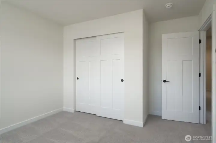 Third Upstairs Bedroom -  Pics are of a different 2601 Hattie plan home. Features and colors may differ.