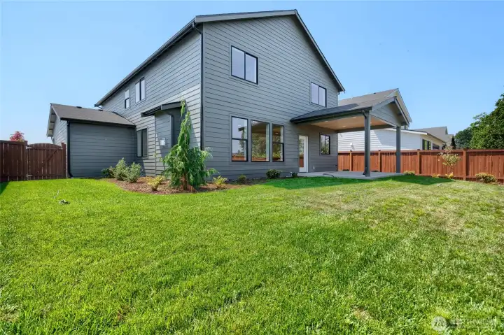 Fenced backyard with gate -  Pics are of a different 2601 Hattie plan home. Features and colors may differ.