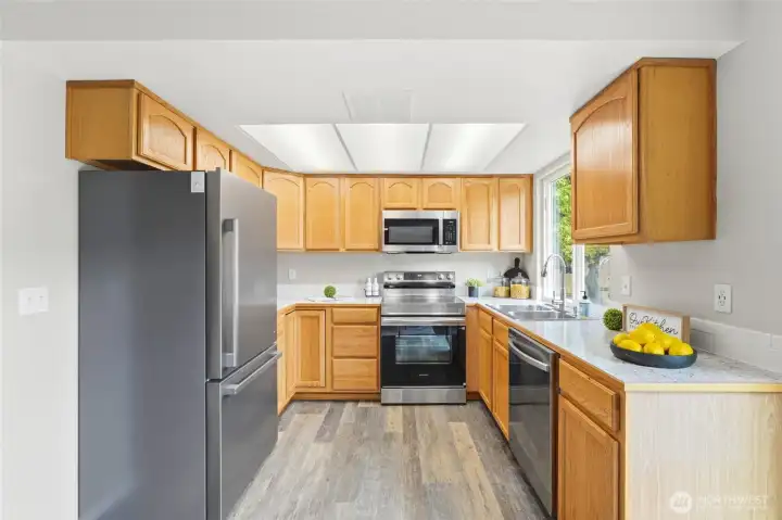 Functional kitchen designed for everyday living. Stainless steel appliances offer modern appeal. Functional kitchen designed for everyday living. Stainless steel appliances offer modern appeal.
