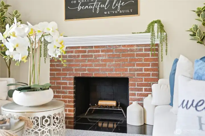 Inviting wood-burning fireplace creates a cozy focal point. Inviting wood-burning fireplace creates a cozy focal point.