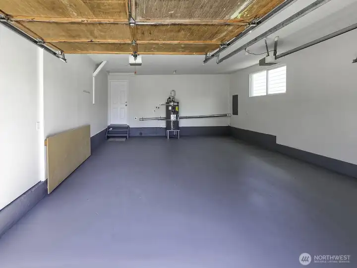 Fully insulated and sheetrocked garage. Fresh paint creates a clean, finished look. Durable epoxy flooring adds style and function. Fully insulated and sheetrocked garage. Fresh paint creates a clean, finished look. Durable epoxy flooring adds style and function.