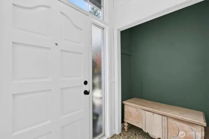 Entrance are with potential coat closet.