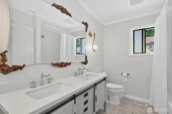 main floor bathroom with double sinks.