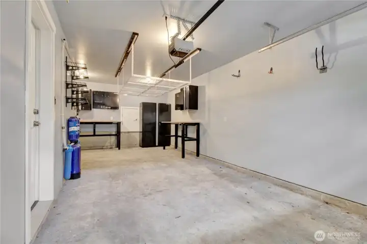 Oversized one car garage with overhead storage. . .
