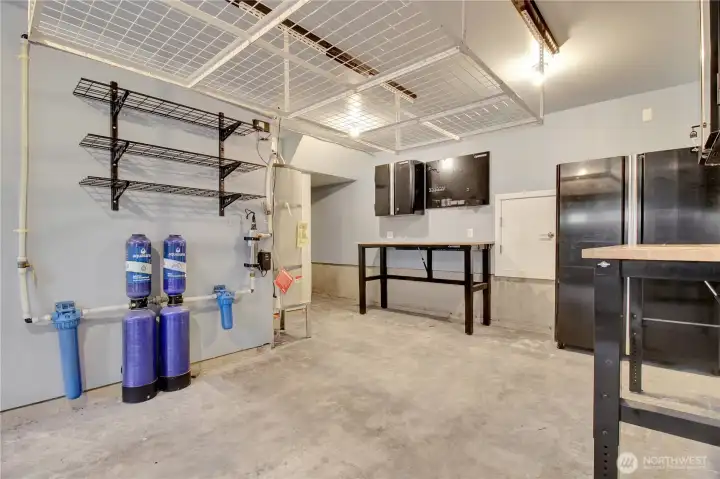 Workbenches, tool cabinets and water filtration system . .