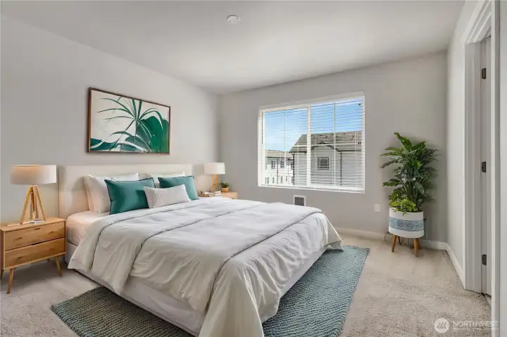 Primary suite, virtually staged. . .