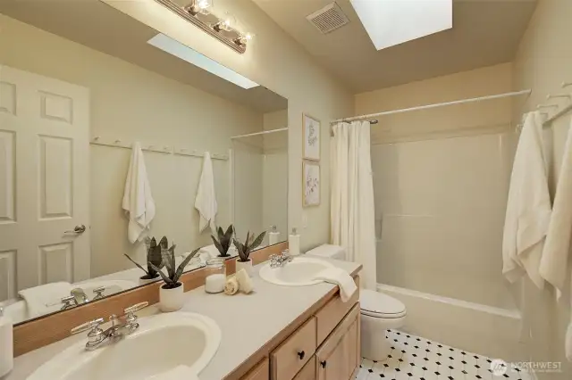 The hall bathroom is available for the additional bedrooms.