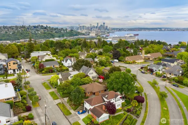 Prime Magnolia location close to the Village, bus stops & Magnolia Park! Aerial looking east toward Downtown Seattle & Elliott Bay