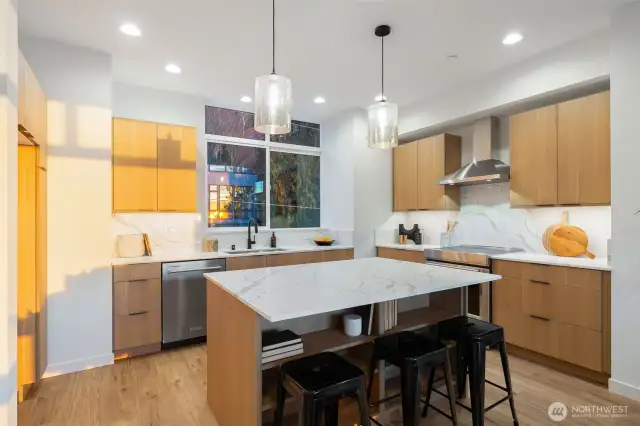 Seated island perfect for a casual bite.  Photos are staged model of same floorplan.  Color schemes may vary.