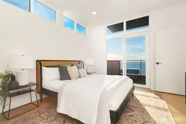 Oversized slider steps out to spacious balcony.  Photos are staged model of same floorplan.  Color schemes may vary.