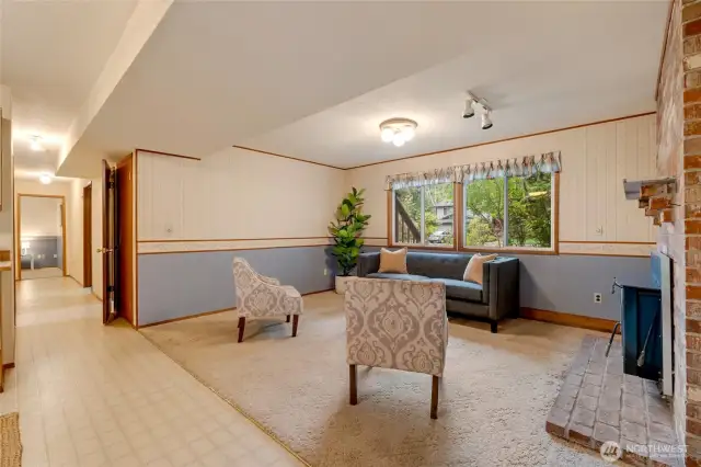 Lower Level Living Space w/wood-burning fireplace