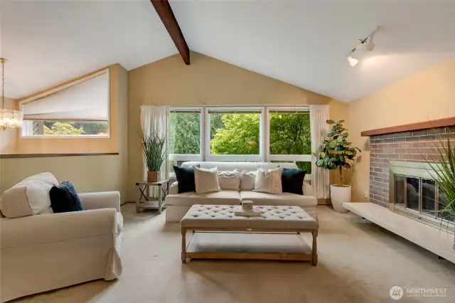 Bright & airy Living Room w/cozy wood-burning fireplace