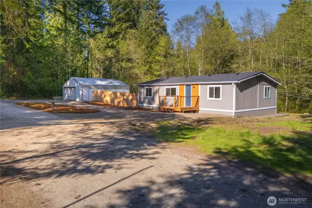Includes large detached shop and lots of turn around room!