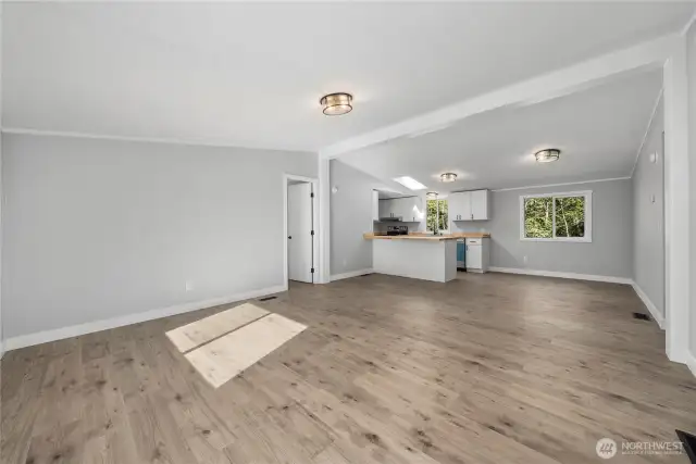 New Flooring, paint, door/trim, kitchen, baths and more!