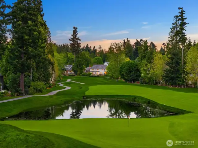 Sited at the head of the 8th fairway of Wing Point Golf & Country Club, this rare, south-facing home has long been considered one of the most prominent and stately properties on the course.