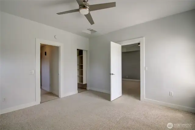 Another view of the front bedroom. It has a mini walk in closet. Doorway to left leads to the bath.
