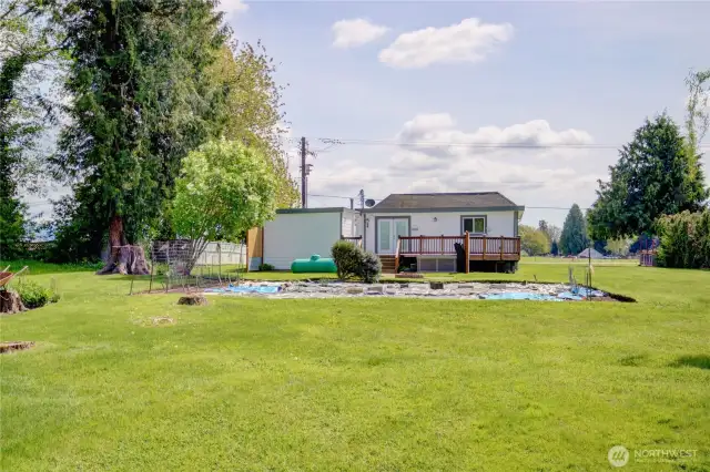 The landscaping is very mature and has an assortment of plantings. The flower beds are all irrigated as well, making for easier watering!