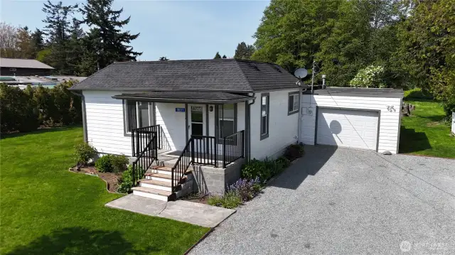 Interesting sidenote. The home was moved here from Burlington around 1976.The roof wouldn't fit under the power lines so they modified it instead. :)
