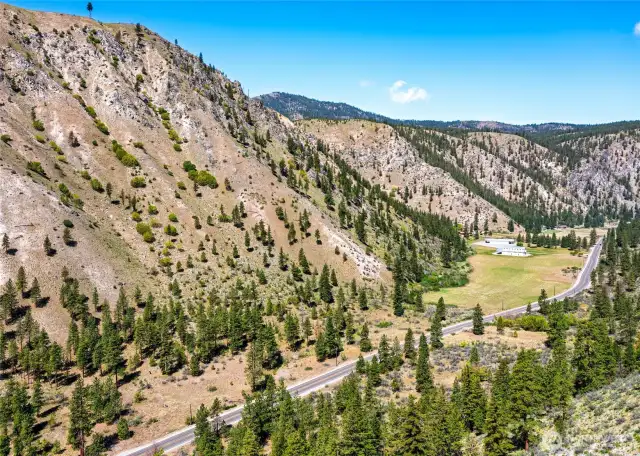 Property extends up slope to west.