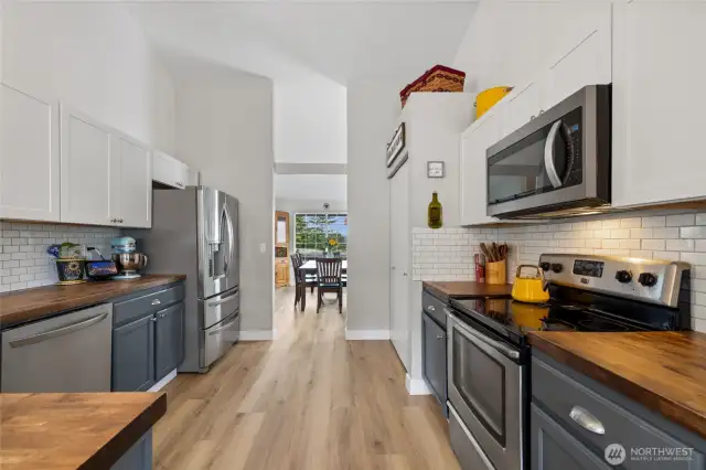 Spacious kitchen with vaulted ceilings & pantry